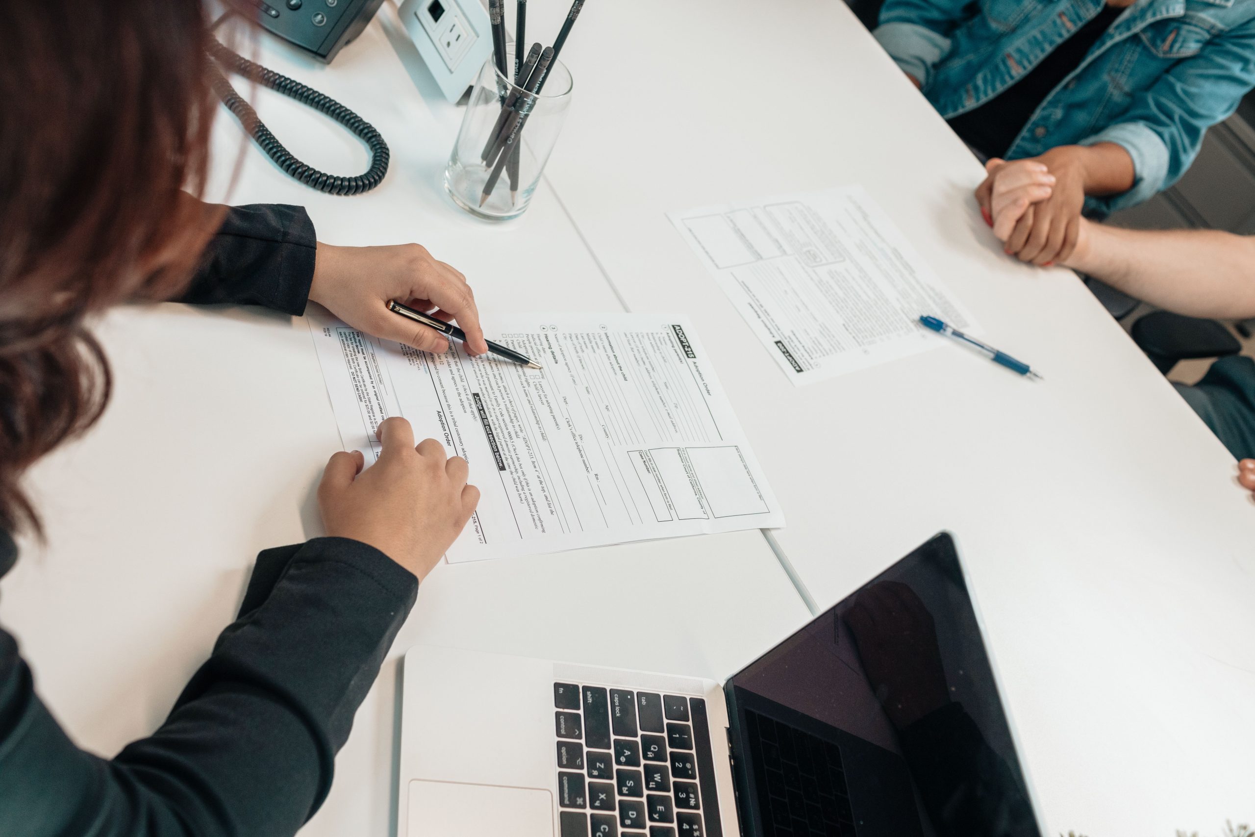 Paperwork being reviewed during a legal consultation